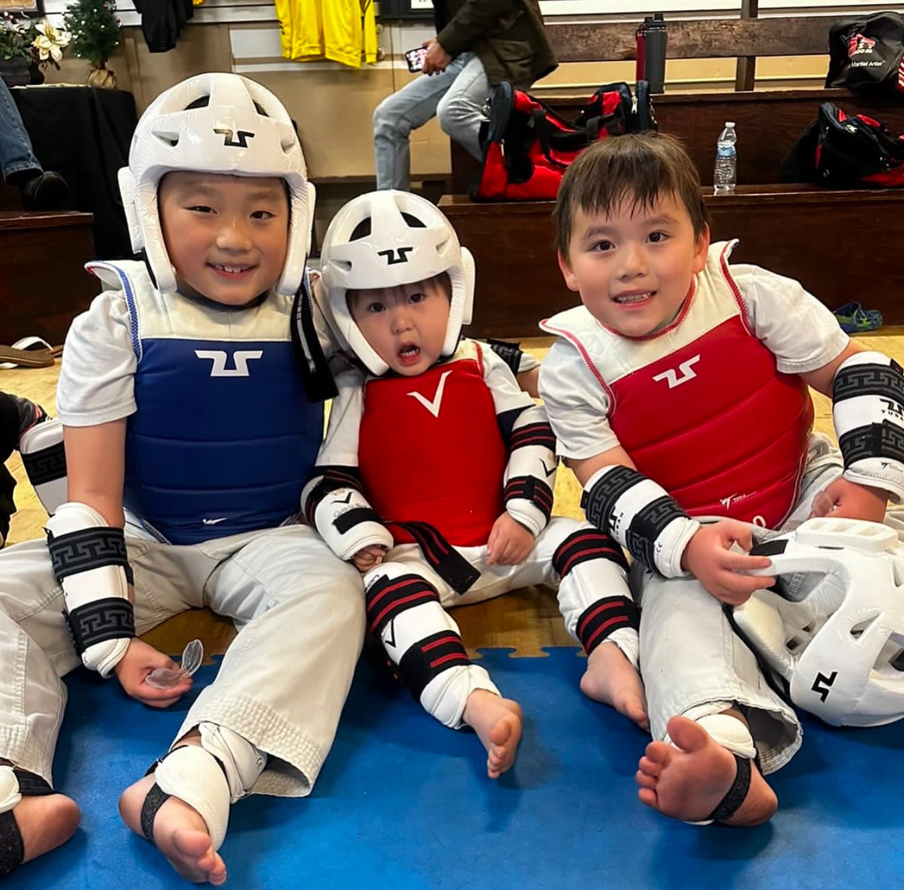 Young martial artists wearing protective gear